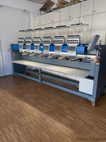 ZSK six-head commercial embroidery machine on the TNT production floor