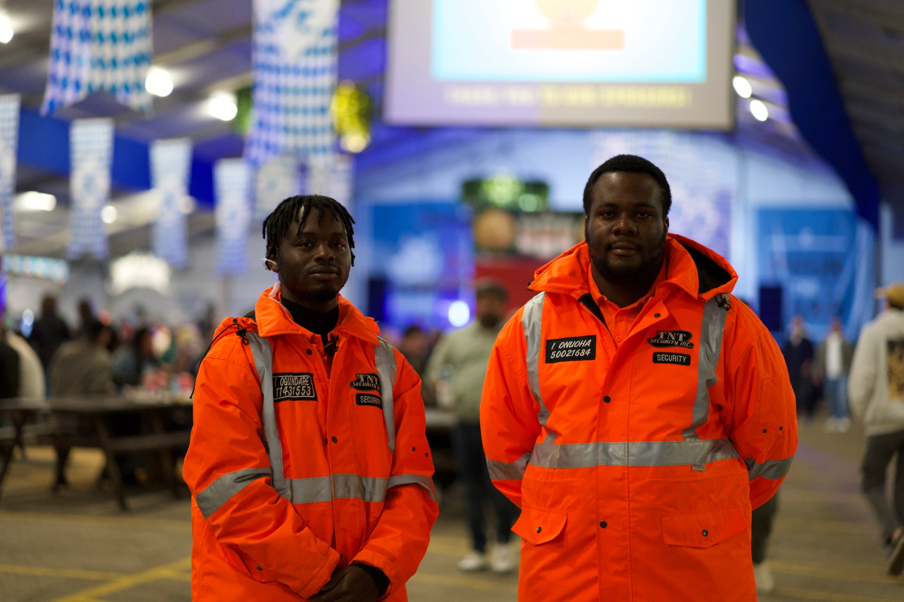 TNT Security guards monitoring an indoor venue